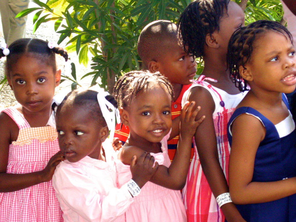 Children who received visas wore name tags on their wrists so they wouldn't get lost in transit.