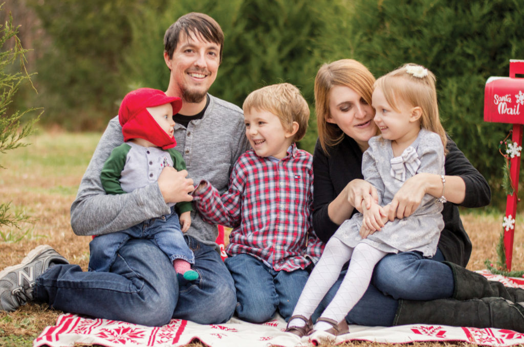 Sponsors Brian and Valerie Goad with their three children.