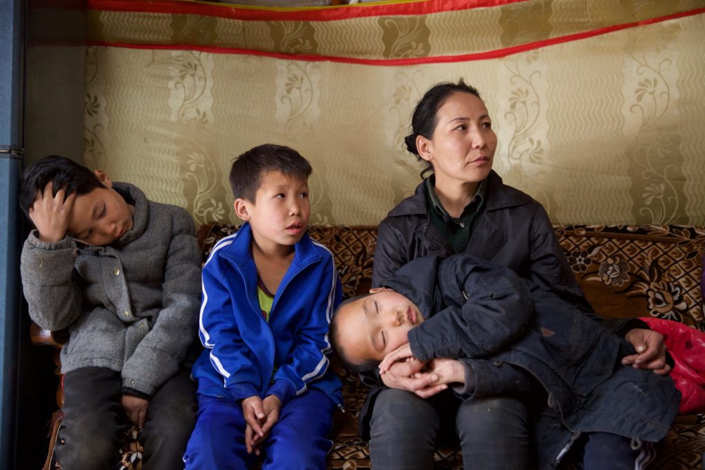 Amin-Erdene’s Mom And Her Children Amin-Erdene’s mom and her children enjoying the comfort of their new ger.