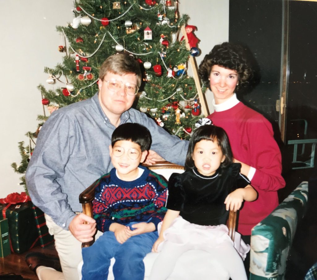 Sally with her dad, Dan, mom, Cathy, and brother, John.