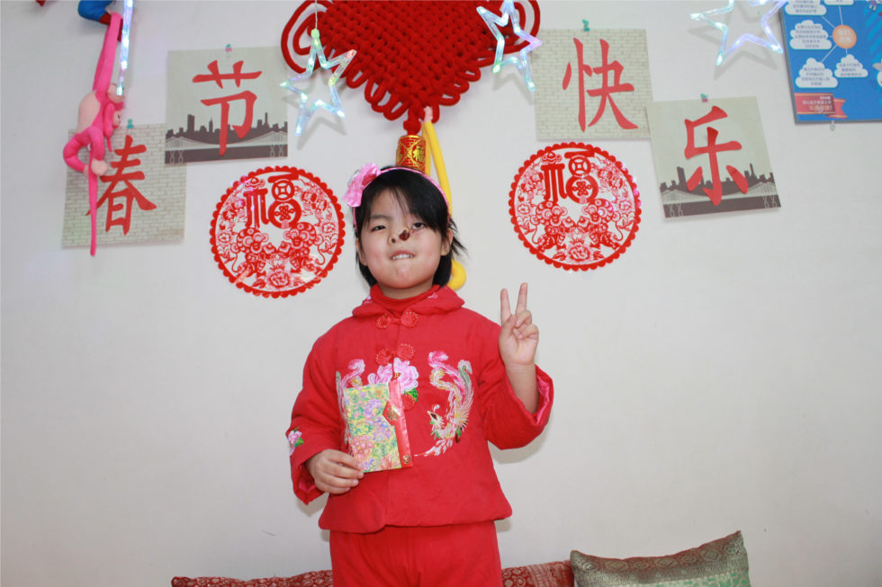 Lucie in China before she came home to her family.