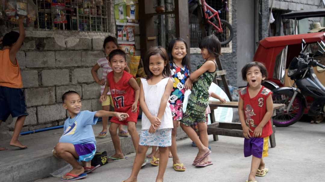 Sponsored children posing for a photo.