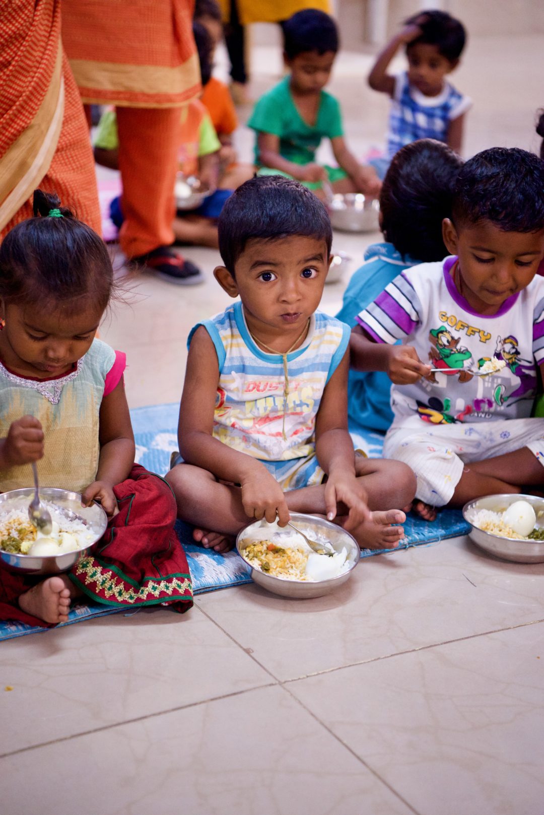 children in poverty eat a meal