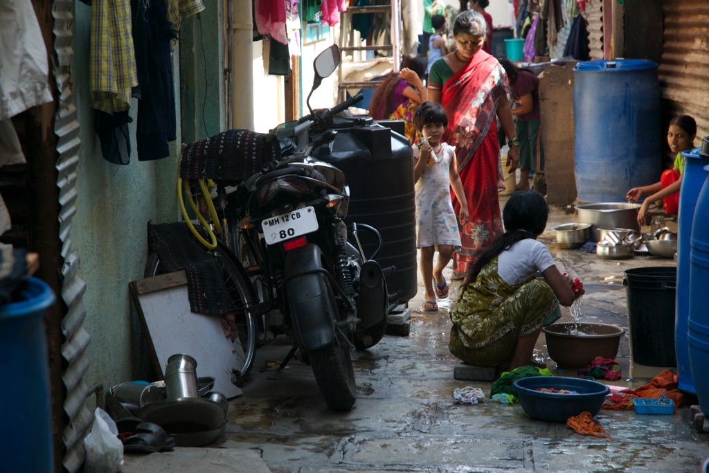 narrow alleyway in Indian slum