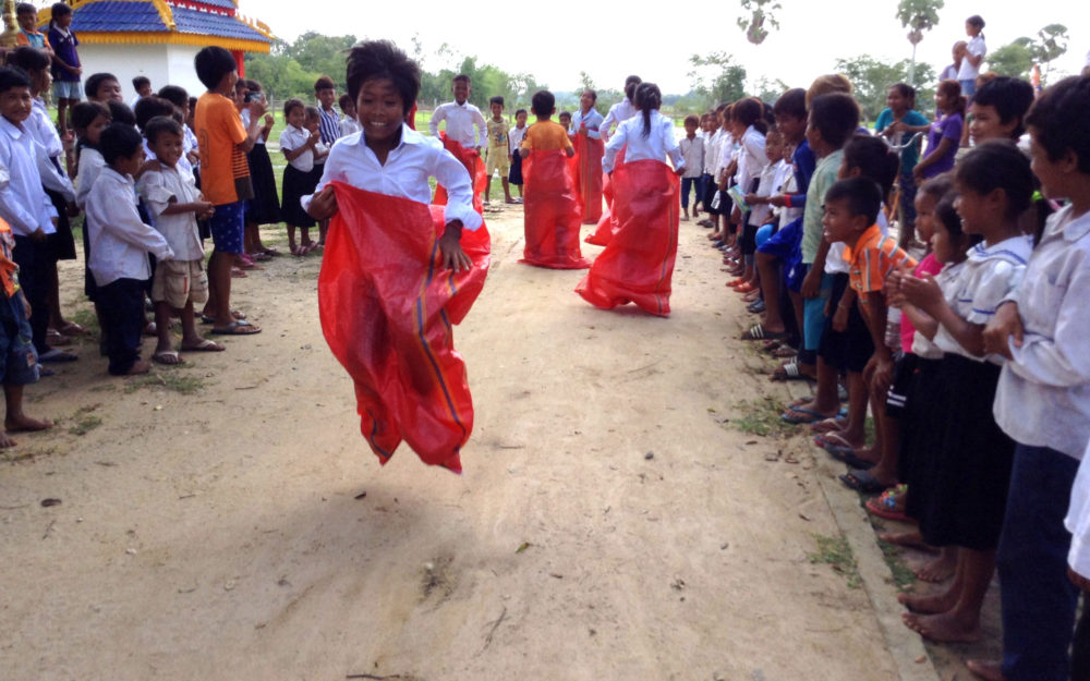 Child racing in a sack