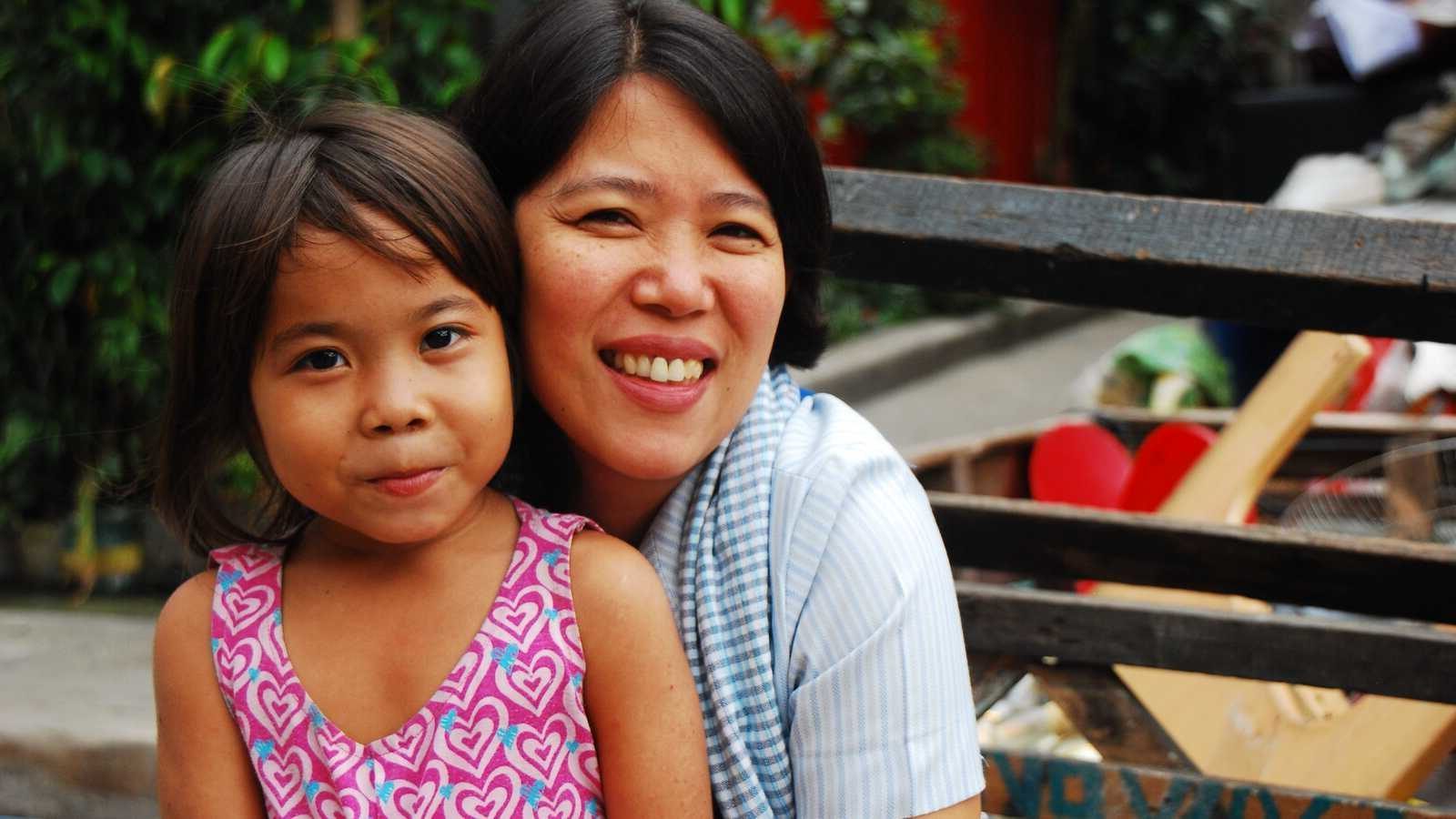 Woman smiling with child