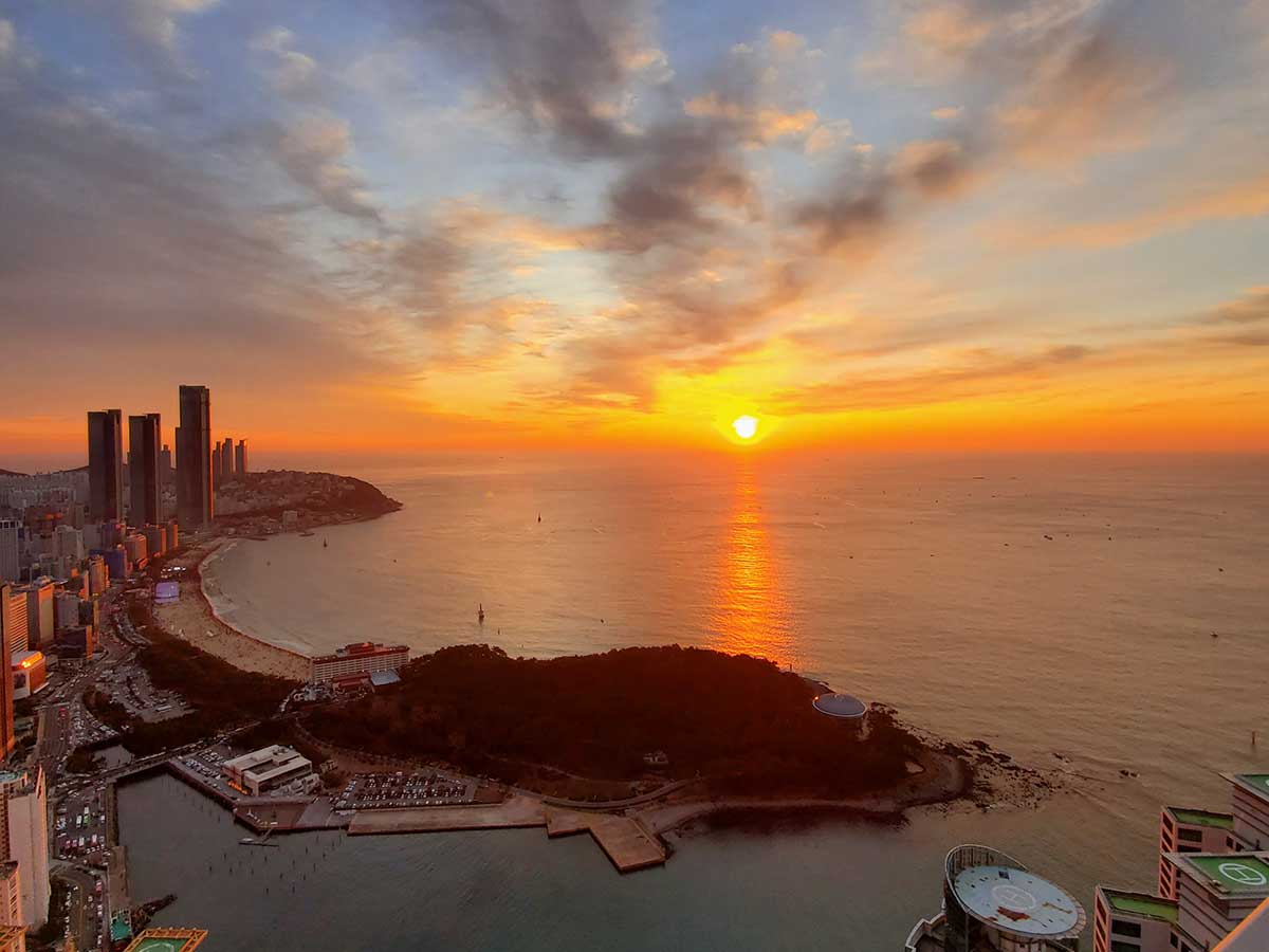 The sun rises over Busan in Korea