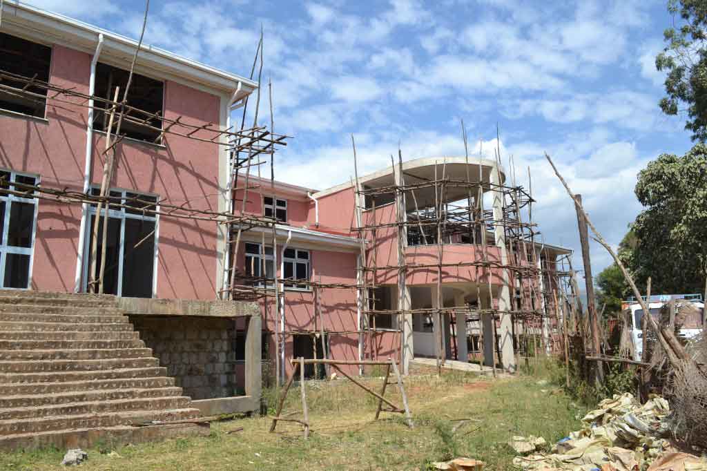 The front of the maternal-child hospital. The round portion in the right of the photo is a ramp large enough for hospital staff to transport patient beds from floor to floor. When the hospital is complete, the ramp will be encased in large glass windows.