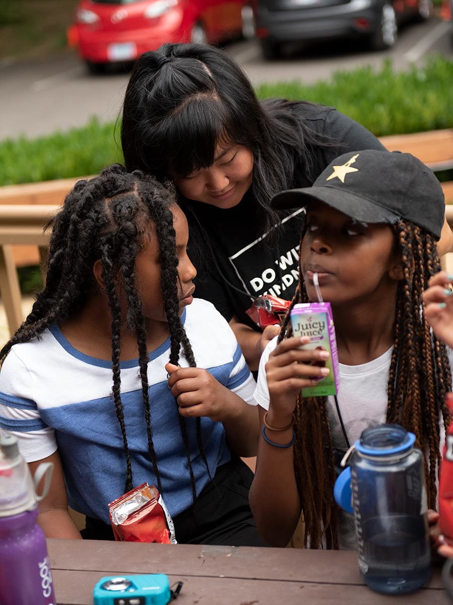 adoptee camp counselor and two adoptees talking