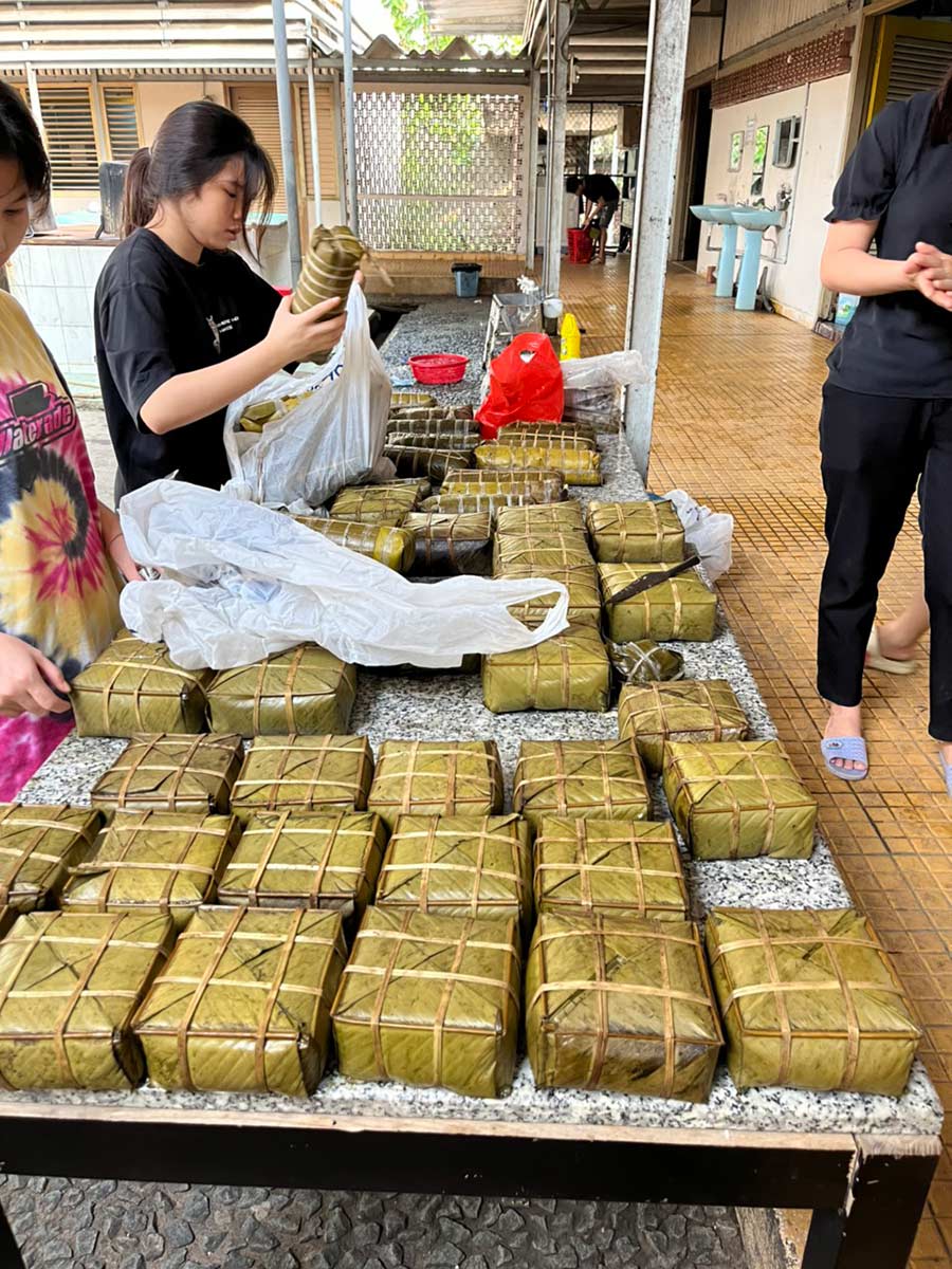 stacks of banh Chung to celebrate tet in Vietnam