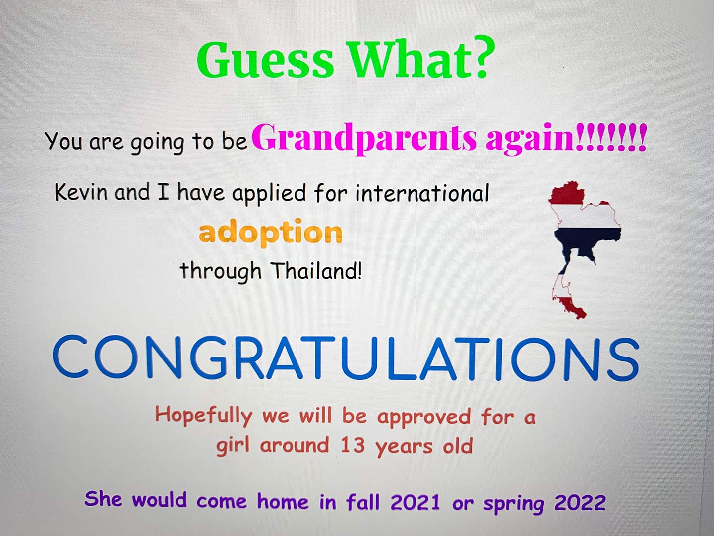 A digital photo slide with an adoption announcement