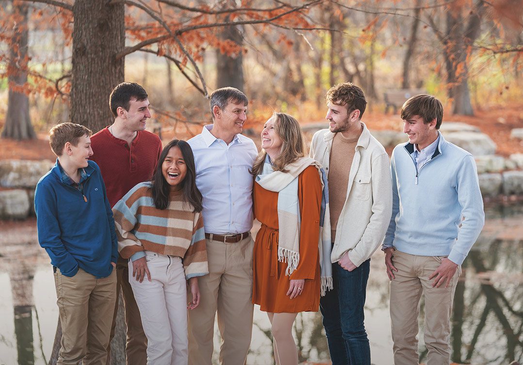 Family photo in autumn by a river