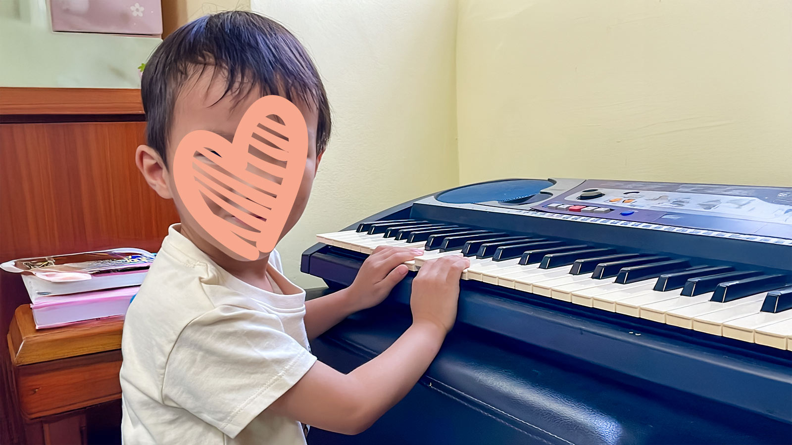 a waiting child plays piano