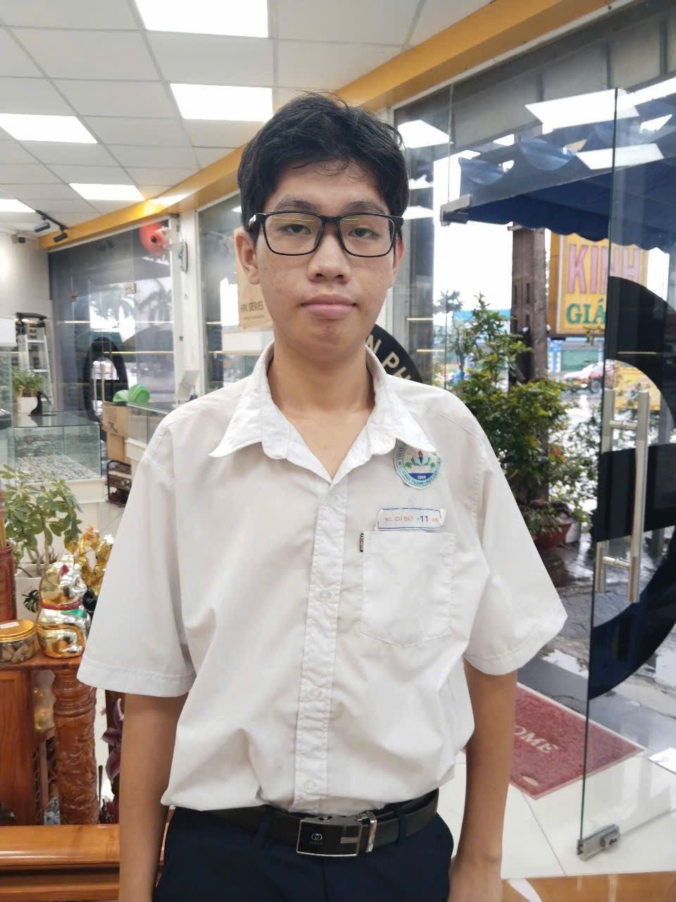 Teenage boy in sponsorship wearing his new glasses that he just received from gifts of hope