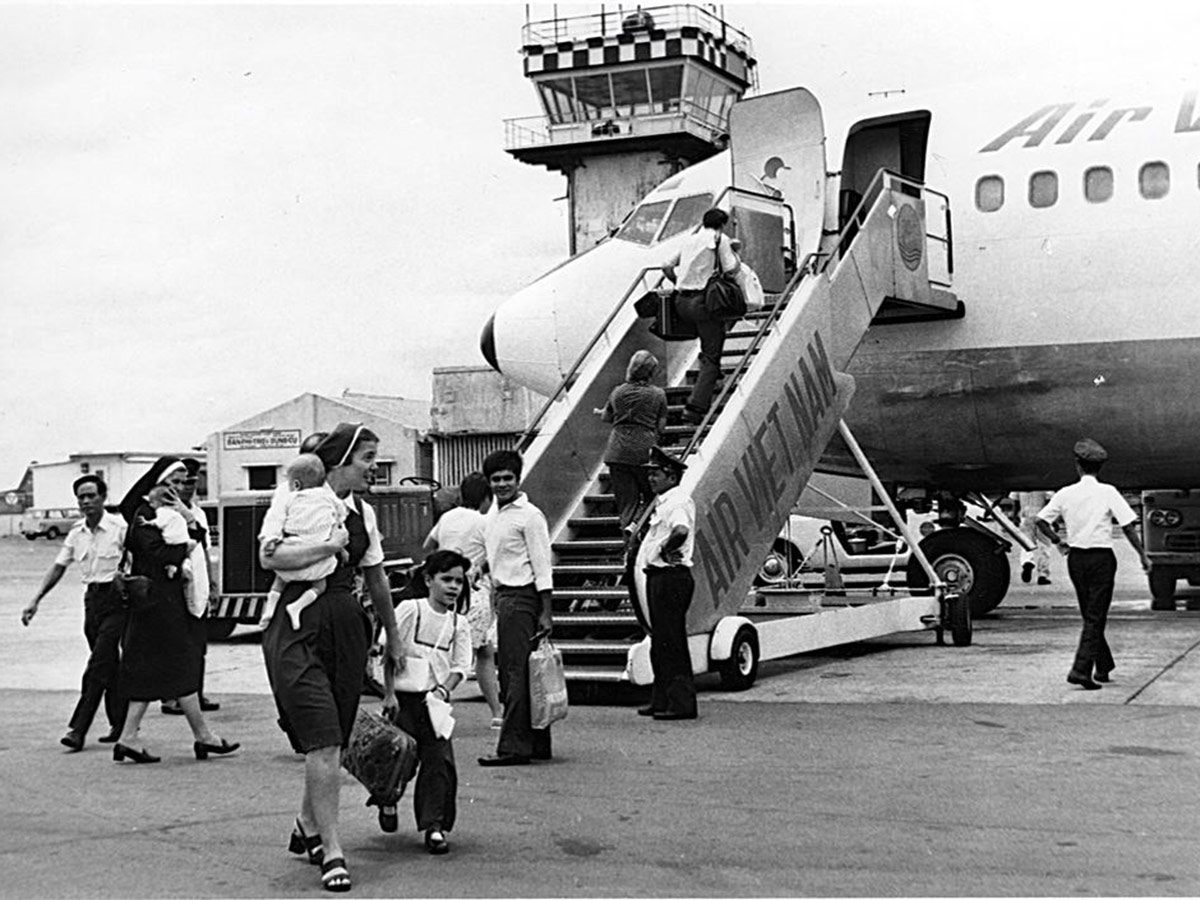 An evacuation flight sits on the airfield in Vietnam where the Operation Babylift flights took place in 1975.