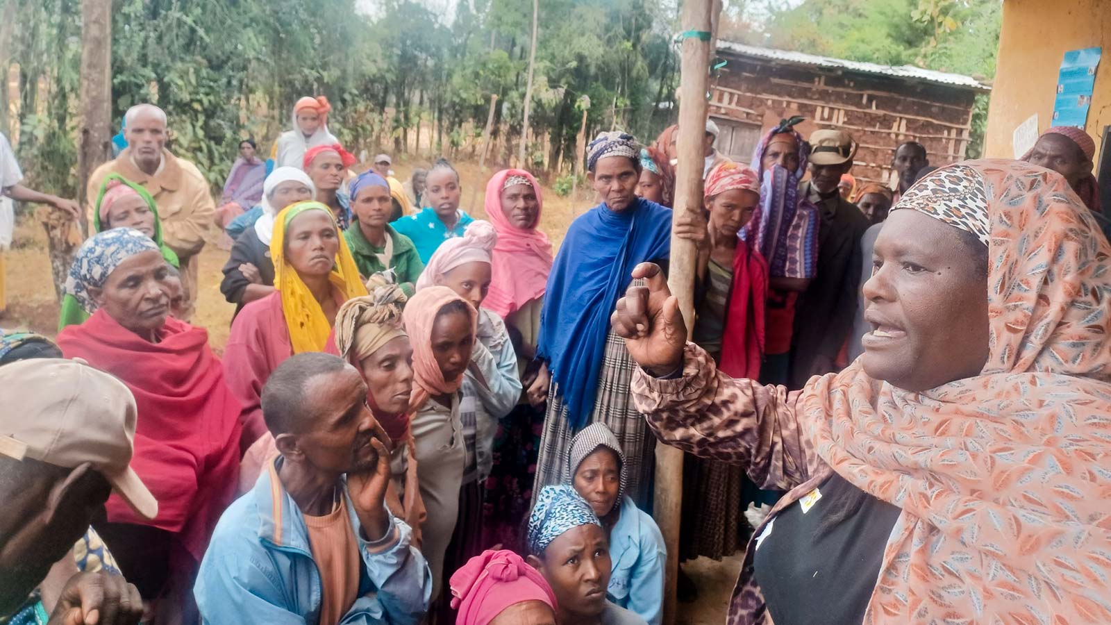 notes from the field: In Ethiopia, the community gathers outside to listen to a talk on autism.