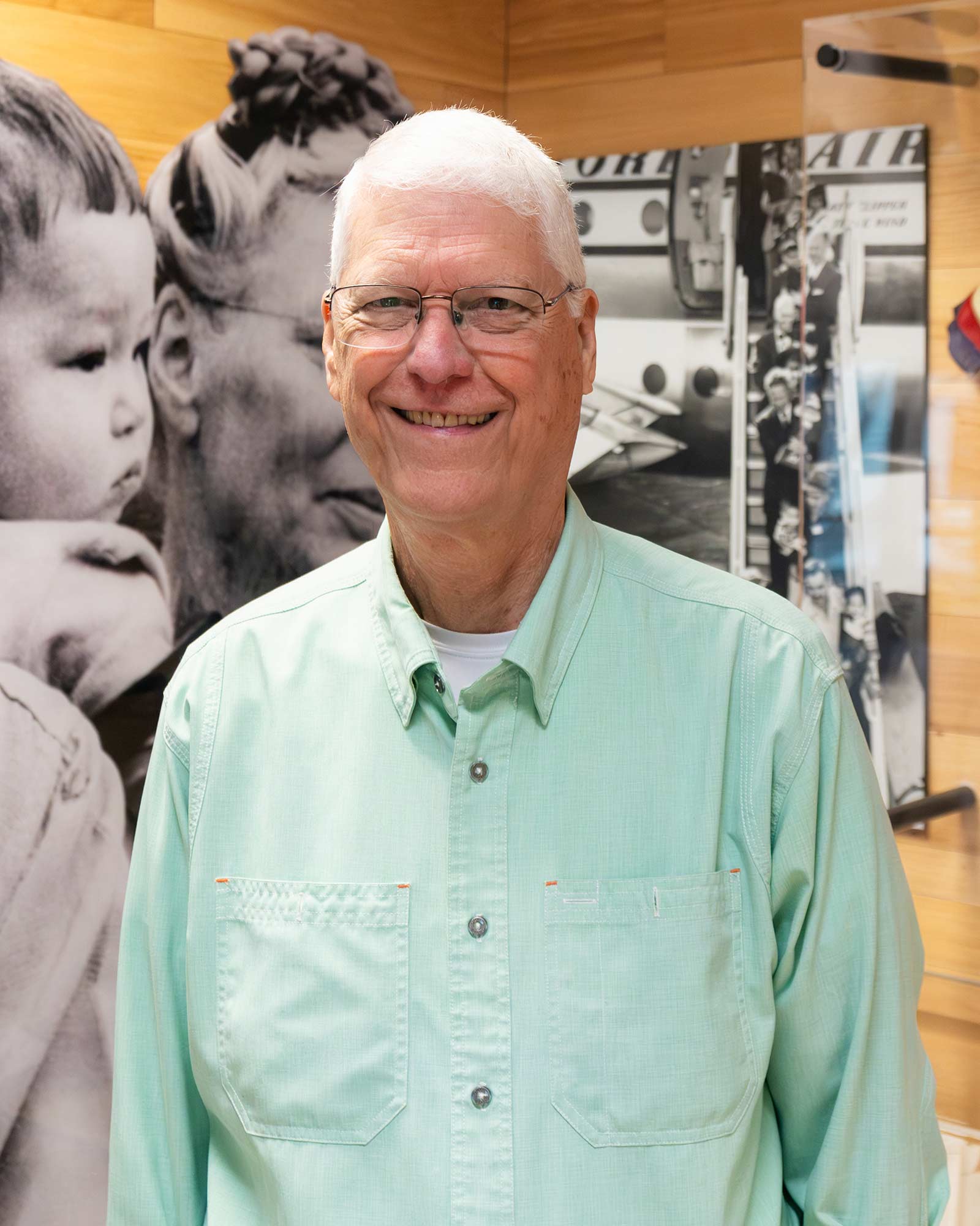 John Williams, who was interviewed about the Vietnam Babylift, smiles for the camera
