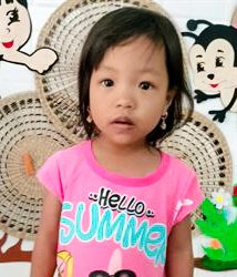 A Holt sponsored child in a pink shirt