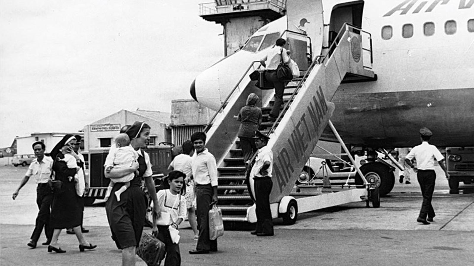 An evacuation flight sits on the airfield in Vietnam where the Operation Babylift flights took place in 1975.