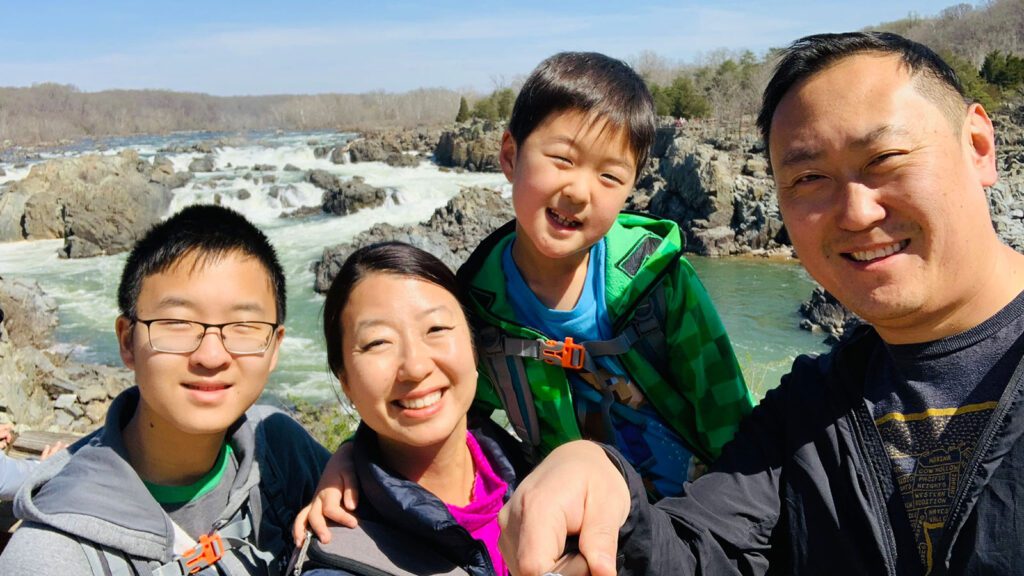 Hollee McGinnis shares a photo with her husband and sons