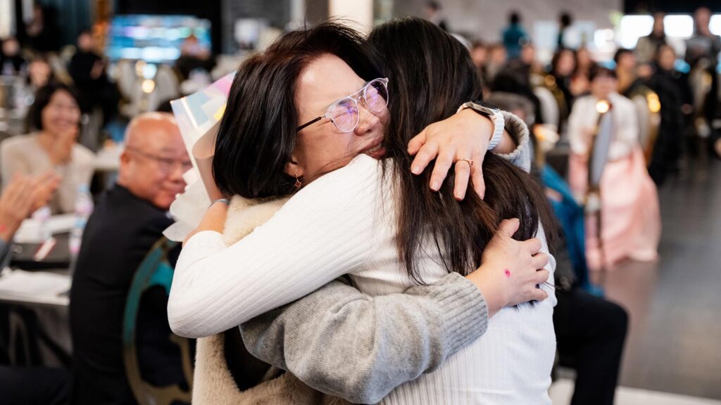 A foster mother and child are reunited