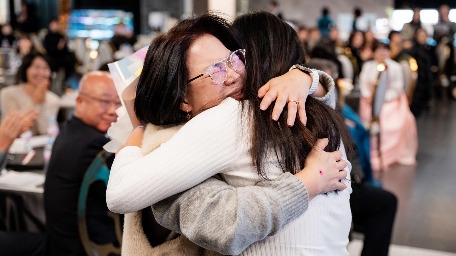 A foster mother and child are reunited