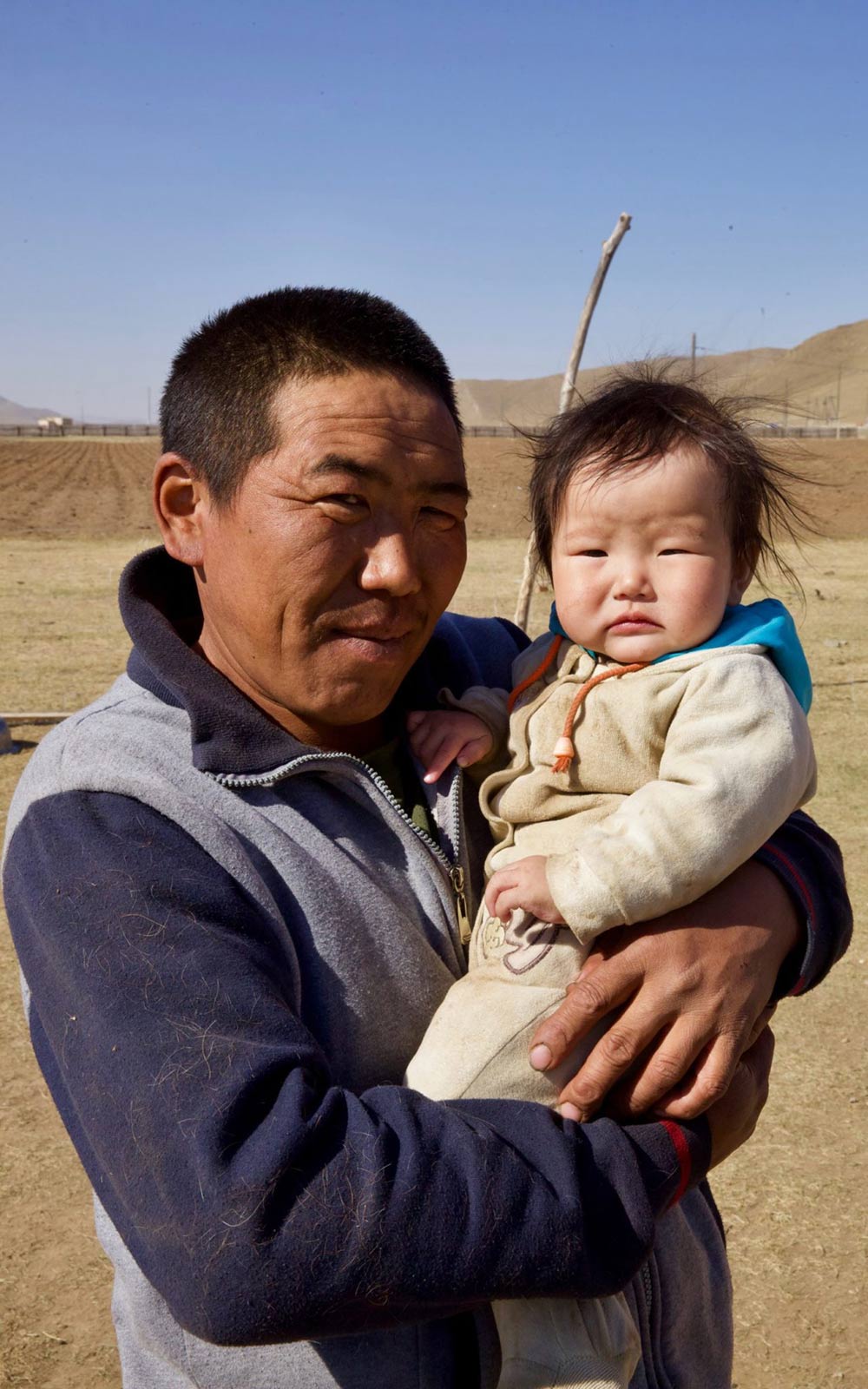 A father and his child in Mongolia