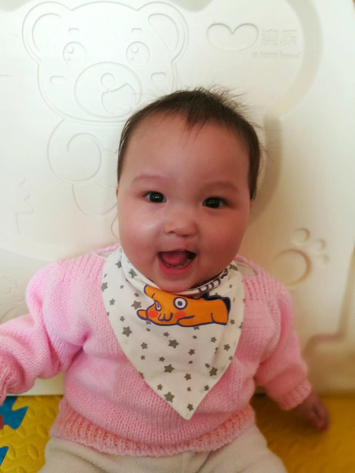 a young child who had heart surgery in china smiles