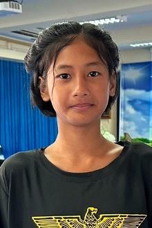 Headshot of Thitikarn, a 13-year-old sponsored child in Thailand