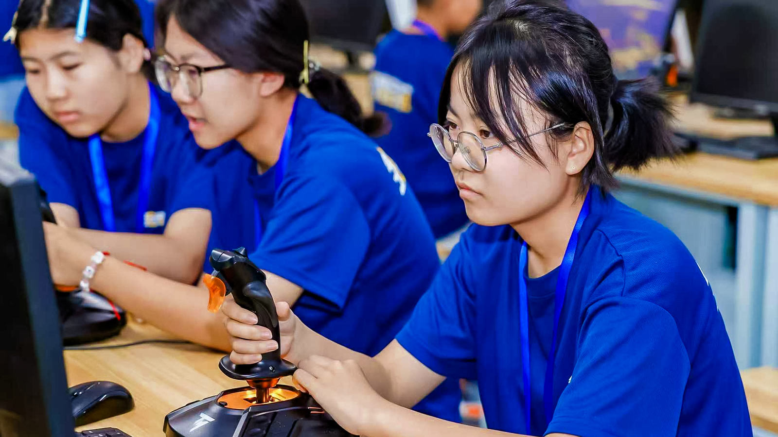 a girl steers a virtual airplane during a field trip in china