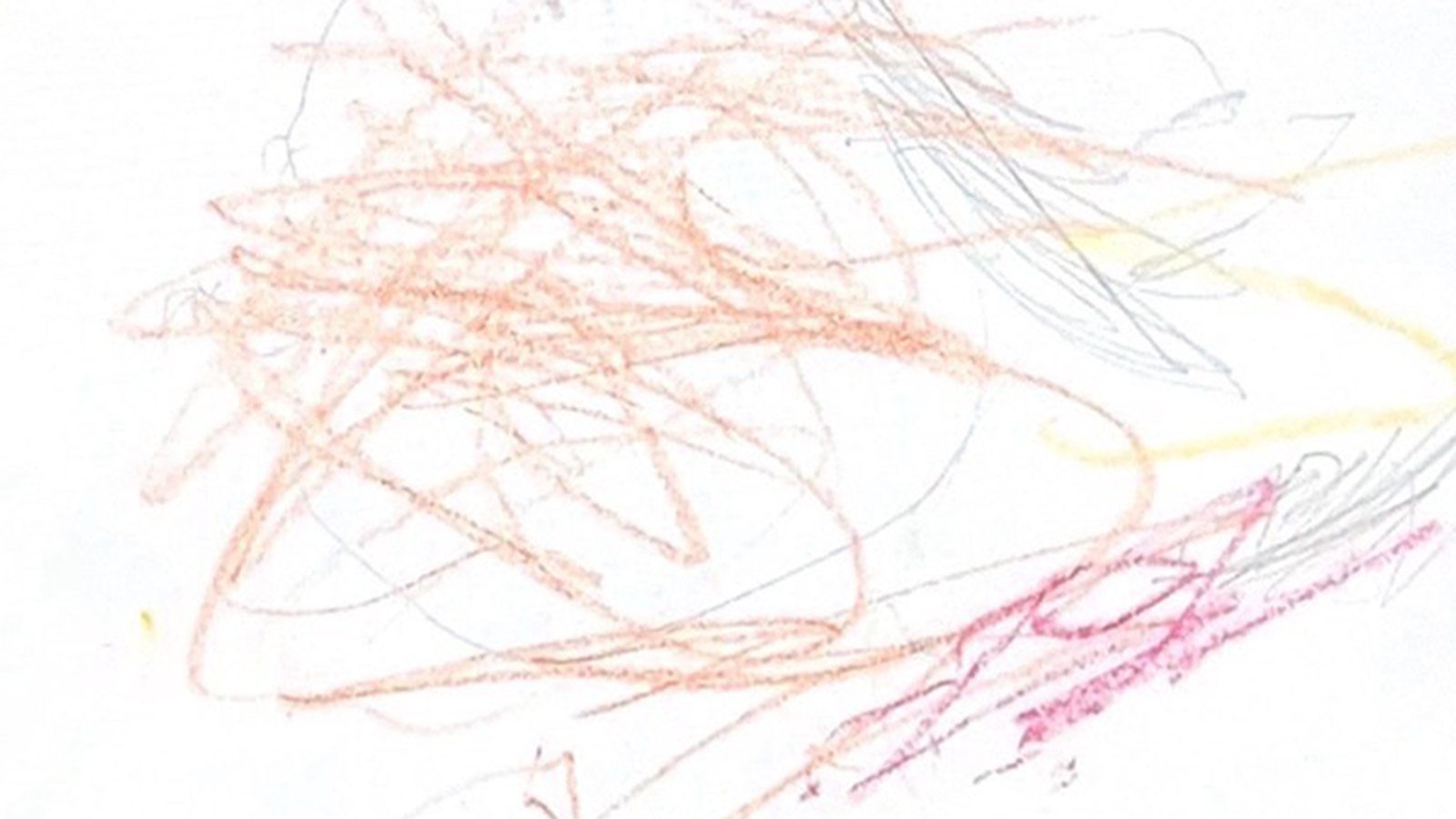 a sponsored child's drawing — orange and red scribbles