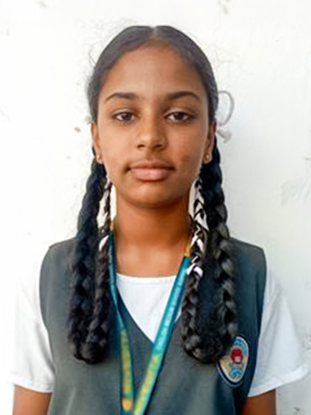a 13-year-old sponsored girl with long braids and a school uniform